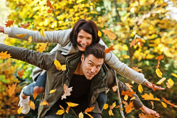 Couple in autumnal surrounding