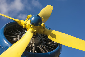 Yellow propeller of a vintage airplane