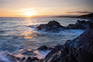 Fototapeta na wymiar Inspiring and dramatic sea view, sunset over the ocean, Cornwall