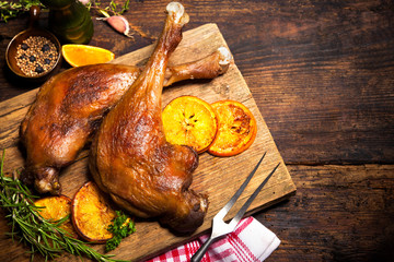 Roasted goose legs with oranges