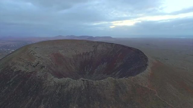 AERAL: Flying over the edge of a huge volcano crater