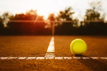 Fotobehang Ball on a tennis court   © yossarian6