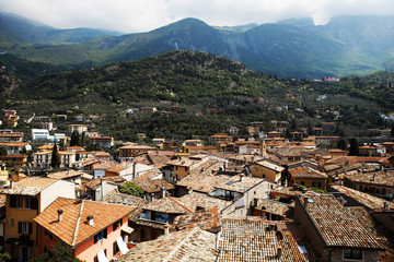 Fototapeta na wymiar luxurious view of ancient city covered with red tile roofs on th