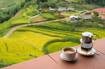 Drip Black Coffee vietnamese style on balcony with alpine backgr - obrazy, fototapety, plakaty