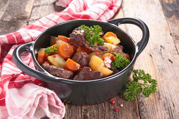 beef stew with wine sauce and vegetables