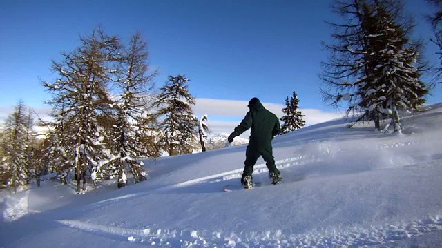 Snowboarders enjoying fresh snow