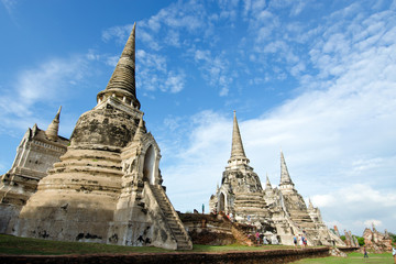 Fototapeta premium Old buddha pagoda temple with cloudy white sky in Ayuthaya Thailand