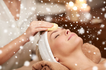 close up of woman having face cleaning in spa