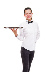 Young woman in waiter uniform holding tray isolated over white b