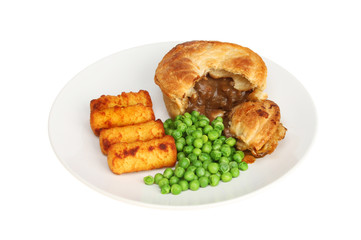 Steak pie with potatoes and peas