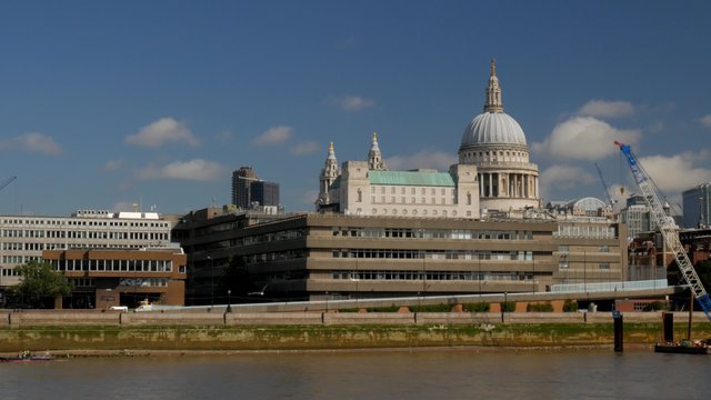 Static shot of St Pauls Cathedral on a sunny afternoon. Shot in 4K from the south side of the River Thames