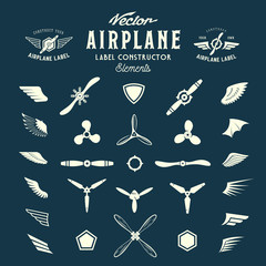 Abstract Vector Airplane Labels or Logos Construction Elements. On Blue Background © createvil