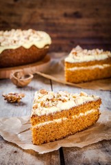 Piece of homemade carrot cake with walnuts