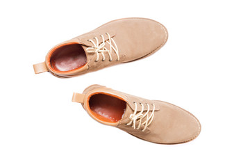 Brown man's fashion shoes isolated on white background
