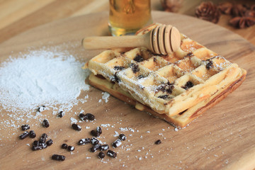 tasty waffle with honey