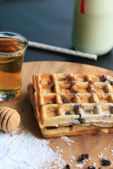 tasty waffle with milk