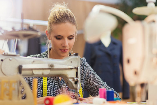 Young Woman With Sewing Machine