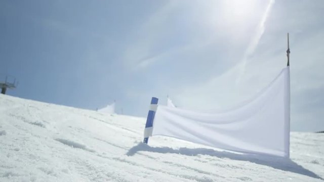 SLOW MOTION: Professional snowboarder at slalom training in ski resort