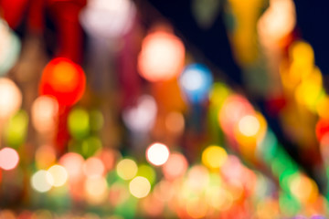 blurred image of yee peng festival decoration with lantern, thailand