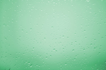 Wet glass with drops of rain