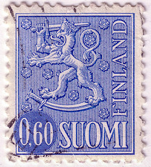 FINLAND - CIRCA 1954: A stamp printed in Finland shows National arms emblem, circa 1954.