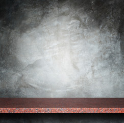 Empty top of natural stone shelves and stone wall background
