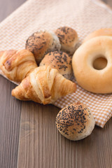 mix bread on picnic fabric and wood table