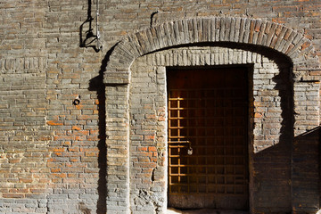 Doors in unusual shapes, Italy, Tuscany.
