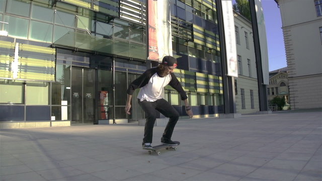 Young skateboarder performing tricks