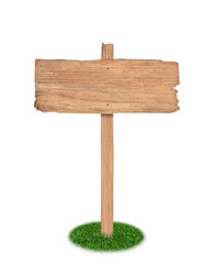 Old Wooden sign on grass isolated