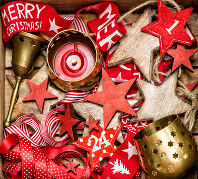 Christmas decoration wooden stars and golden candles