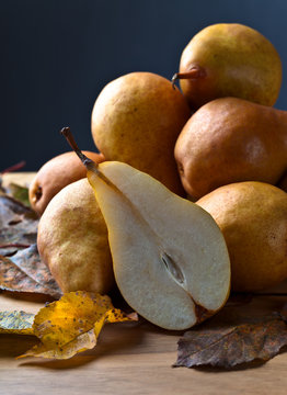  pears on wooden table