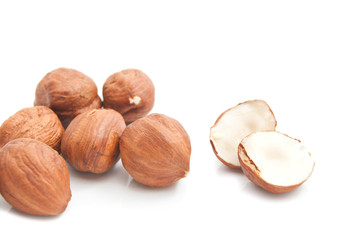 some tasty hazelnuts on white