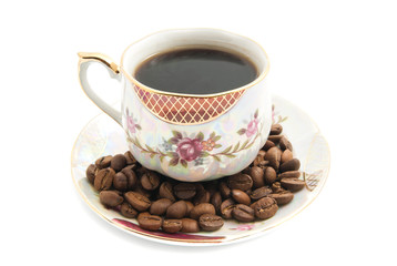 coffee beans and mug of coffee