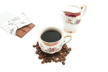 cup of coffee and chocolate bar