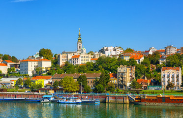 Belgrade from river Sava with tourist riverboats on a sunny day, Serbia - obrazy, fototapety, plakaty