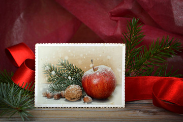 Christmas card with vintage photo and natural Christmas decoration