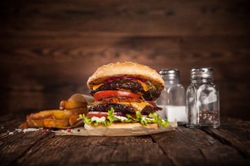 Delicious hamburger on wood