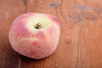peach set on the wooden background