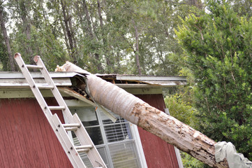 EF0 tornado damage on house roof