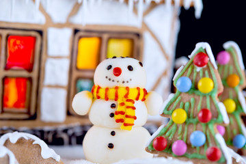 Sugar snowman and Gingerbread house