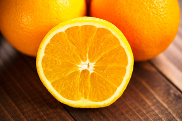 Oranges on the Wood Table with Christmas Background