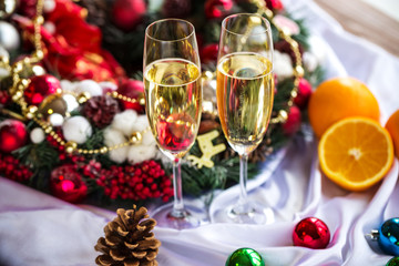 Two champagne glass on christmas background