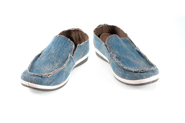 pair of  shoes of denim canvas on a white background