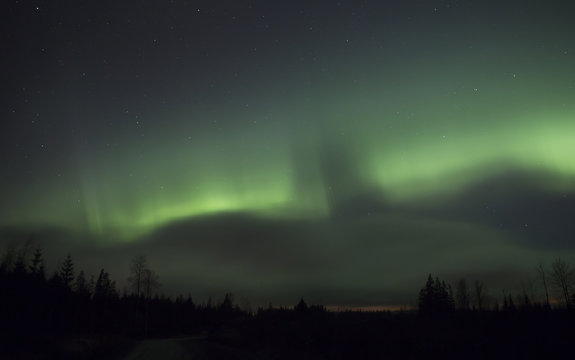 A beautiful scene during awesome effect in the sky. The northern lights filled the sky in early November.