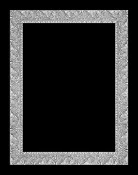 The antique silver frame on the black background