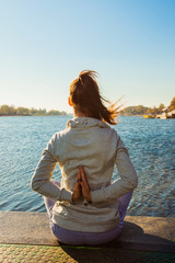 practice yoga by the lake