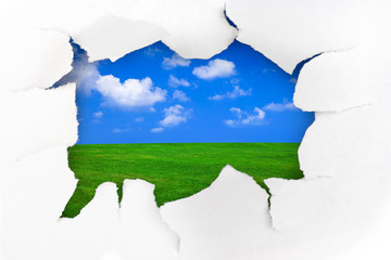 Paper hole and summer landscape