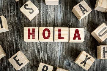 Wooden Blocks with the text: Hello (in Spanish)