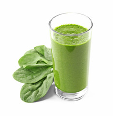 Glass of spinach juice isolated on white